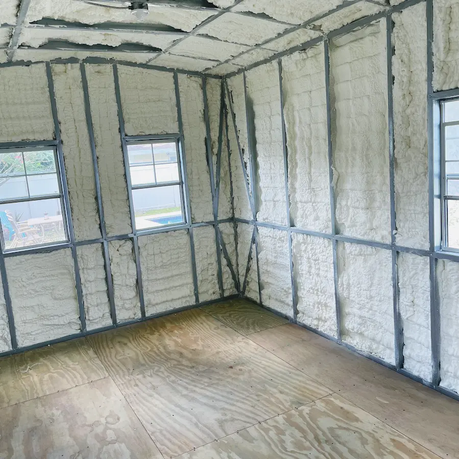 Closed-cell spray foam insulation applied to wall cavities in a residential project in Connersville